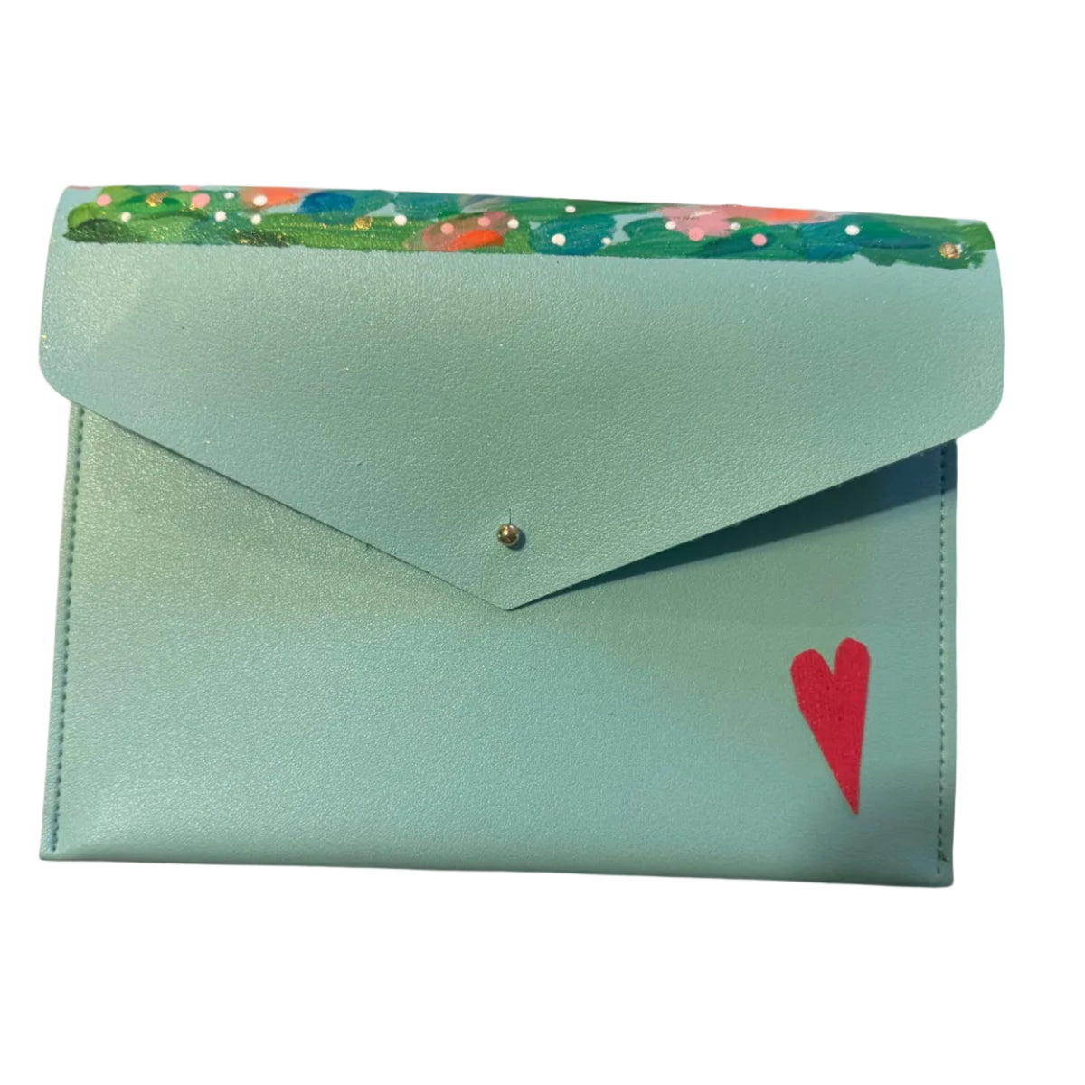 A mint green faux leather envelope-style wallet with a small red heart painted on the front, resting on a light marble surface.