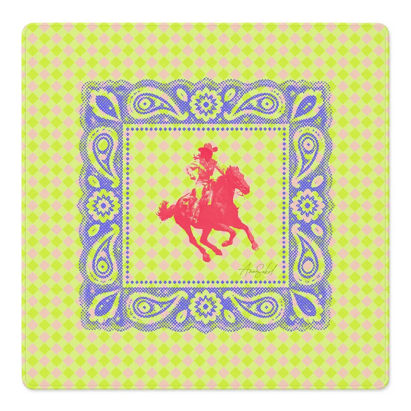 A square bandana-style print with a bright lime green and pale pink diamond pattern border, a blue paisley-style frame, and a central pink silhouette of a cowboy riding a horse. Anna Sokol at the bottom